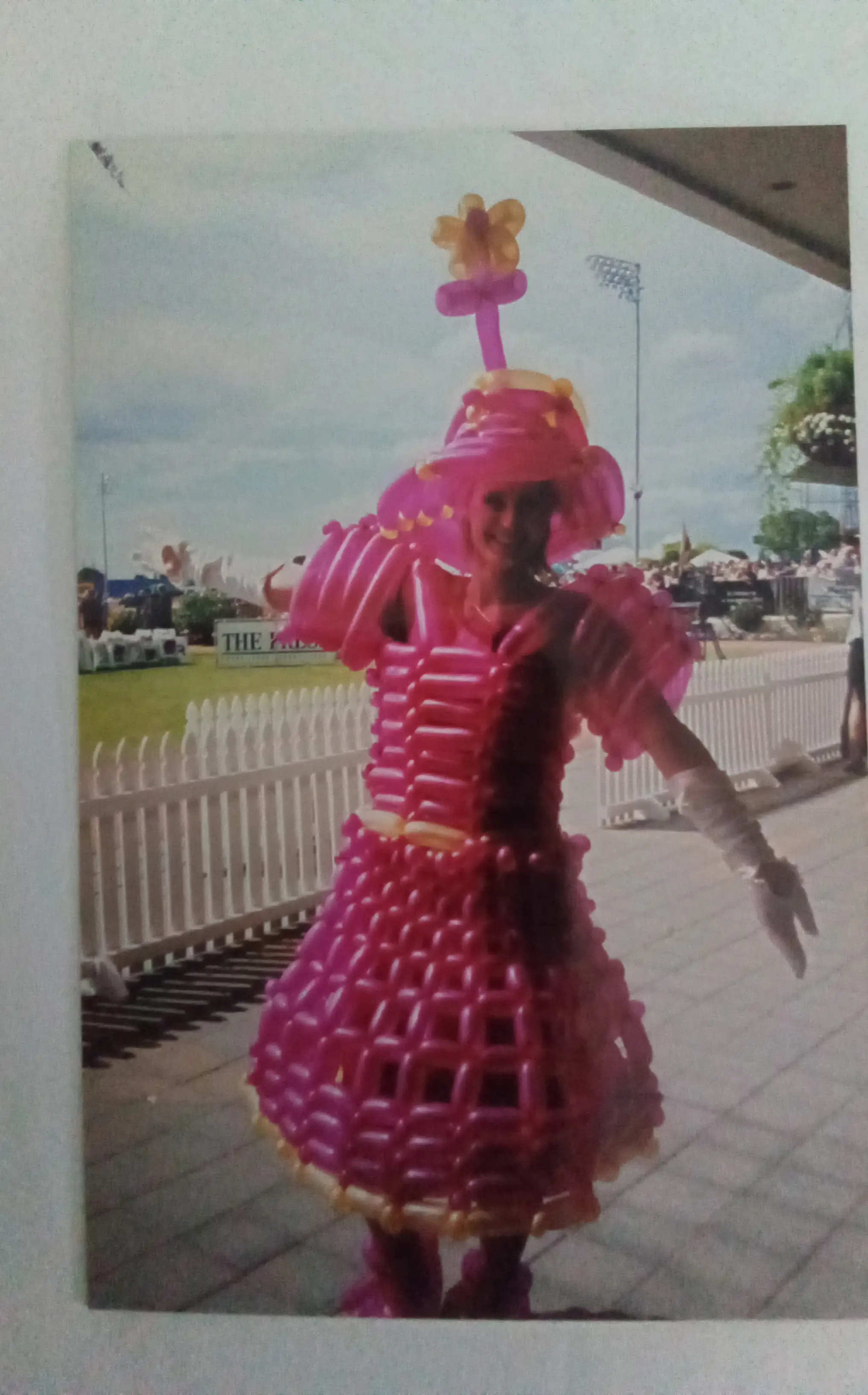 Silly Milly master balloon artist with a giant crown