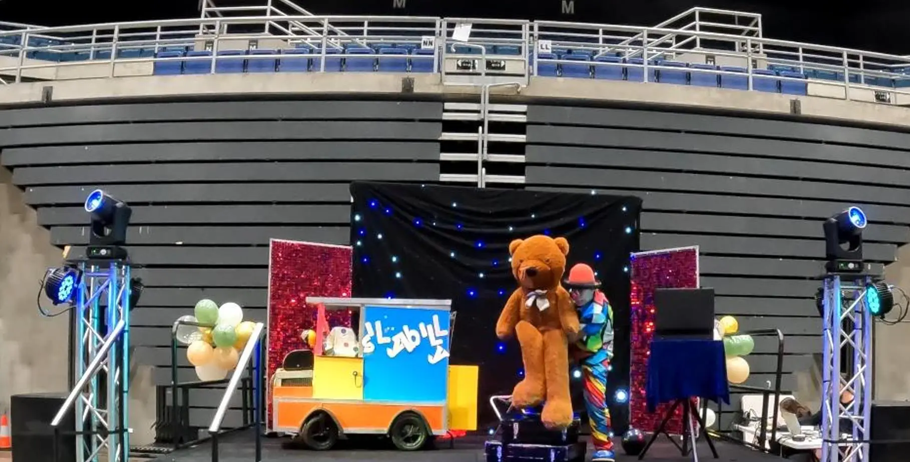 Silly Billy performing his interactive kids magic show on stage